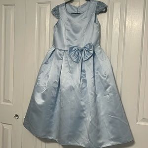 Beautiful sky blue Juniors dress with bow and lace sleeve accents and petticoat